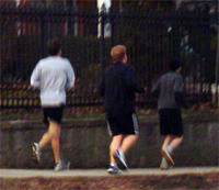 three teenagers running